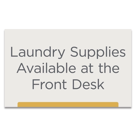 'Laundry Supplies Available at the Front Desk' Sign