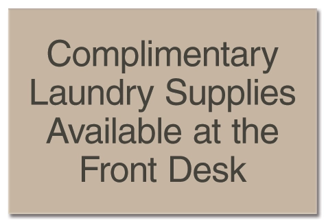 Comp. Laundry Supplies at Front Desk Sign